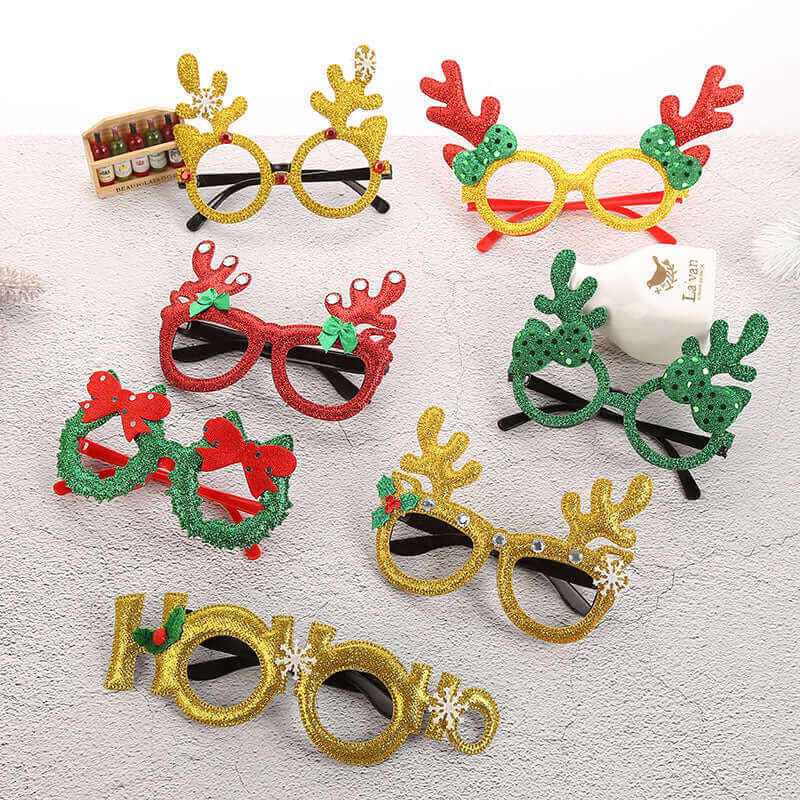 Colorful Christmas children's glasses frames with festive decorations like fur ball antlers and diamond accents